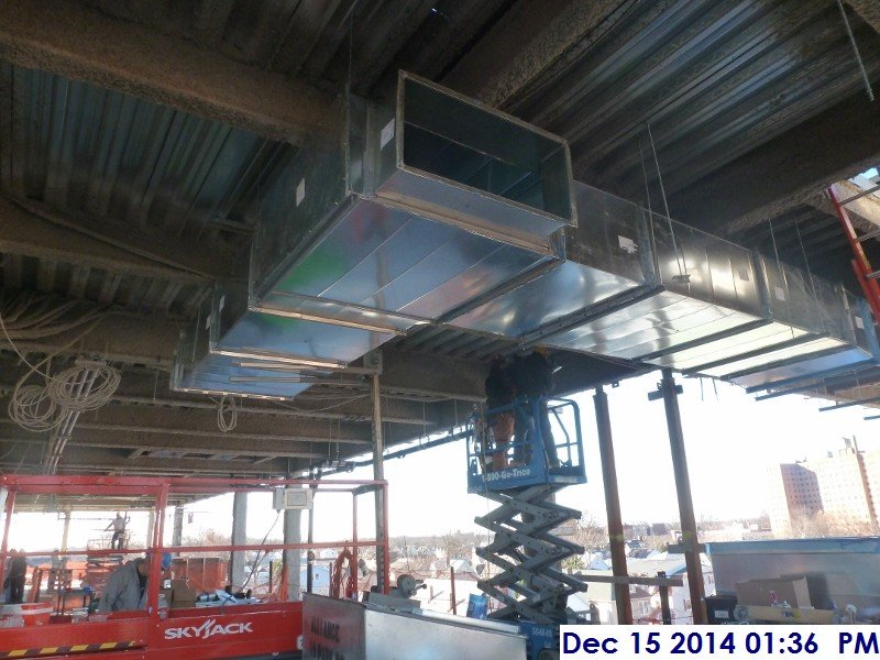 Installing ductwork at the 4th floor Facing West